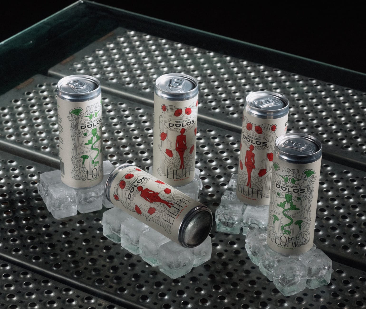 Five Dolos cans standing on blocks of ice on a perforated steel table